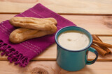 (Atol de elote) the traditional drink of Guatemala, made of corn and cinnamon.