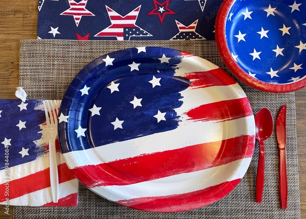 Red, white, and blue paper plate on a table for a Independence Day