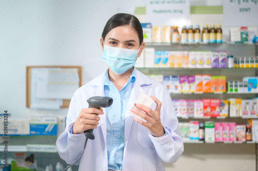 Portrait of female pharmacist wearing face mask in a modern pharmacy drugstore. Portrait of female pharmacist wearing face mask in a modern pharmacy drugstore.
