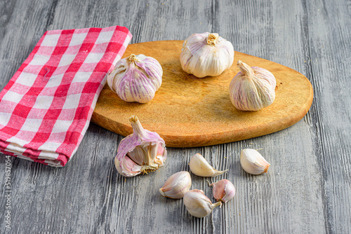 garlic on a wooden chopping board