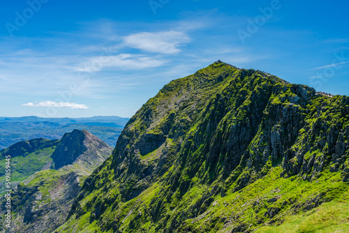 A scenic view of the Mount Snowdon summit on a bright sunny day, Wales