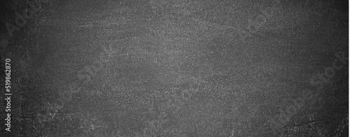 blackboard chalkboard chalk texture background. Black chalk board texture empty blank with writing chalk traces erased on the board. Copy Space for text advertisement. School board display.