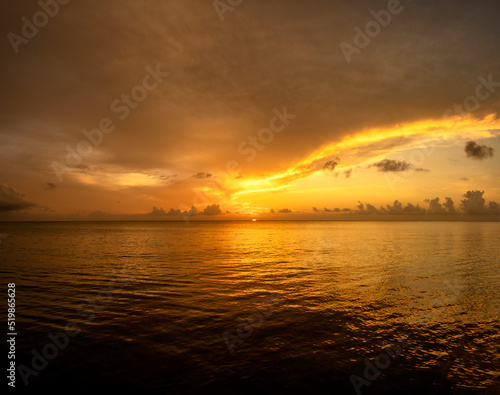 A magnificent orange sunset in Cozumel, Mexico