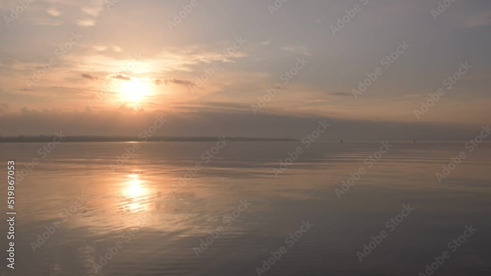 The first rays of the sun, a beautiful Dawn over the sea on the Kerch embankment Crimea Russia. Video. HD The first rays of the sun, a beautiful Dawn over the sea on the Kerch embankment Crimea Russia. Video. HD