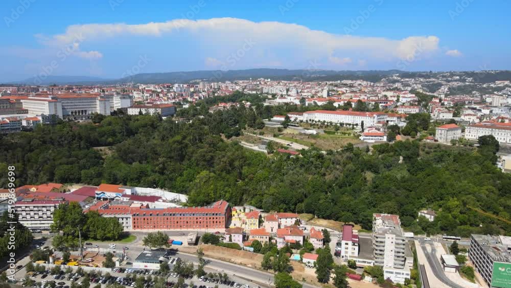 An aerial view of Coimbra (Portugal) and surrounding mountains on the right bank of Mondego River; the University of Coimbra campus is on the left, the Coimbra Military Health Center is straight ahead An aerial view of Coimbra (Portugal) and surrounding mountains on the right bank of Mondego River; the University of Coimbra campus is on the left, the Coimbra Military Health Center is straight ahead