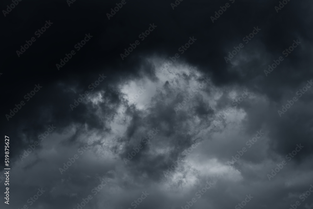 Stormy rain big fluffy clouds. Dark sky. Natural scenic abstract background. Weather changes backdrop. Sky filled with voluminous clouds. Stormy rain big fluffy clouds. Dark sky. Natural scenic abstract background. Weather changes backdrop. Sky filled with voluminous clouds.