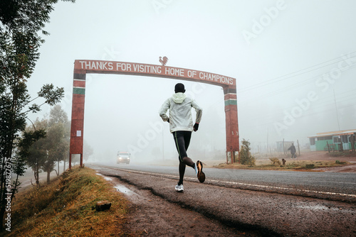 Runner with the inscription Thanks for visiting Iten, home of Champions, running training in Kenya. Marathon running, illustration photo photo