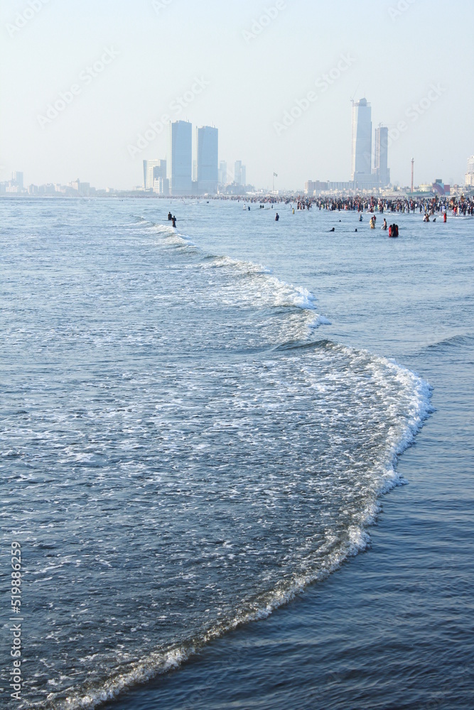 A beautiful picture of seaview wave with buildings karachi sindh ...