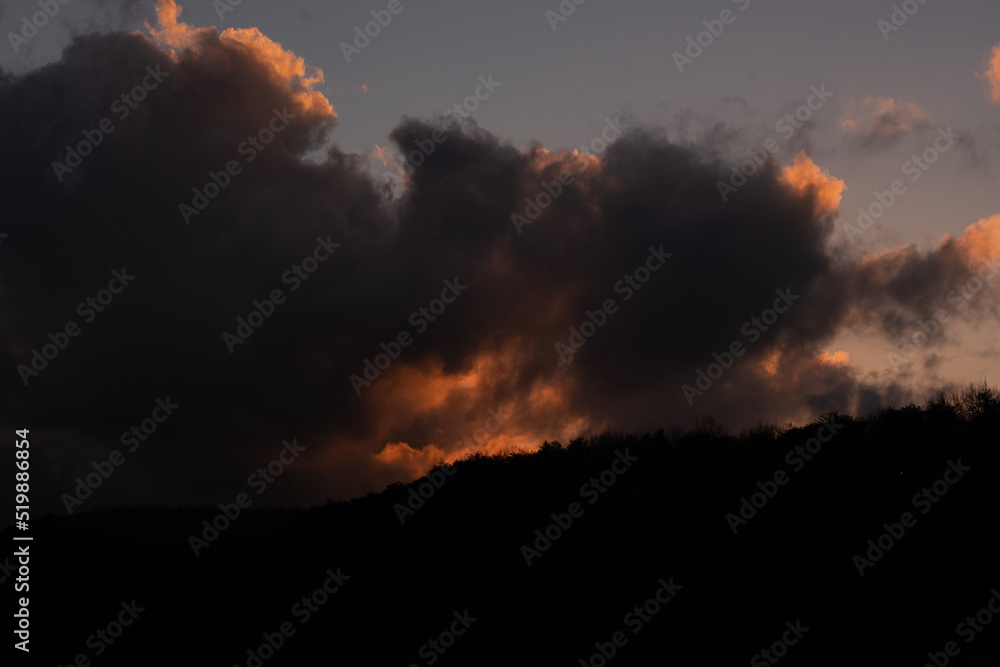 Naklejka premium sunset in the clouds