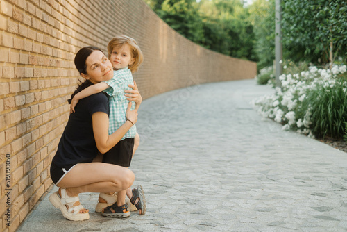 Beautiful mother and her cute little boy photo