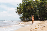 woman in swimsuit on the beach in Costa Rica