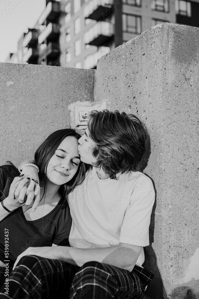 boyfriend kissing his girlfriend on the forehead Stock Photo | Adobe Stock