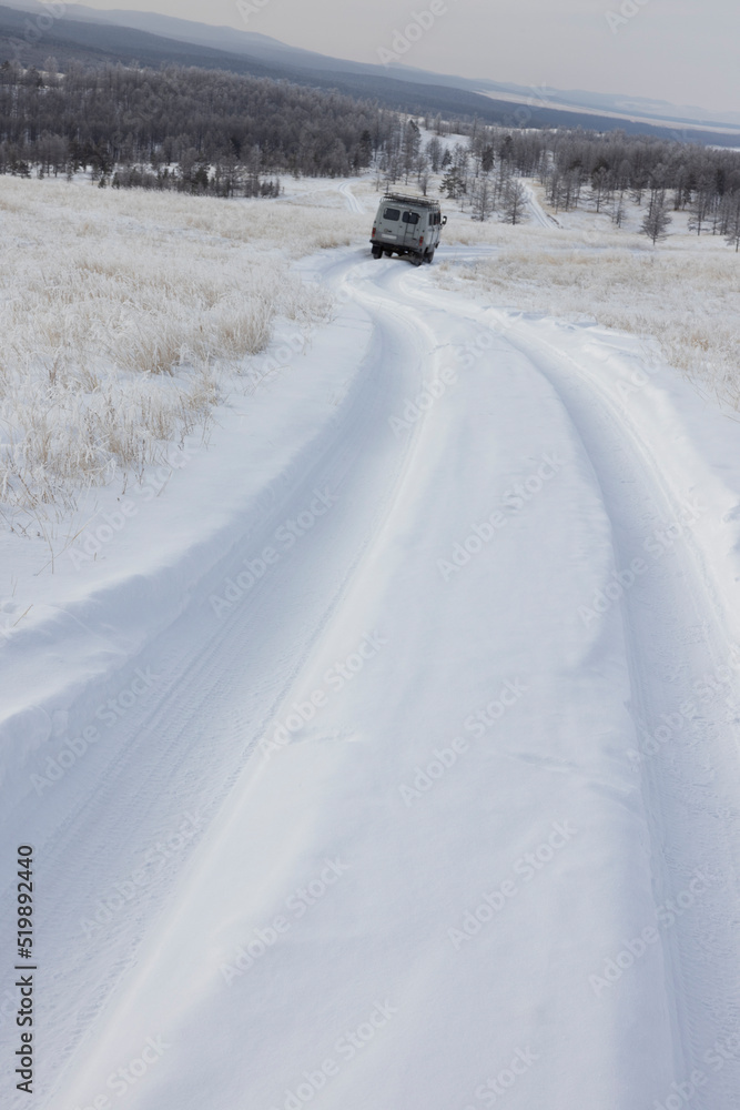 van going down icy and frozen road van going down icy and frozen road