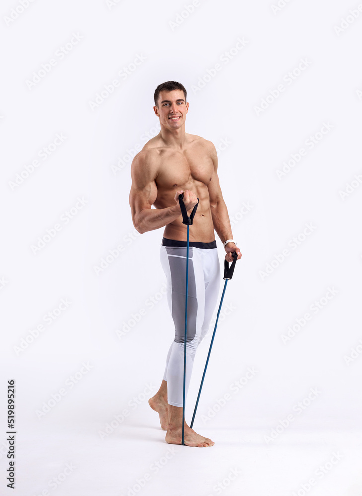 Athletic man doing fitness exercises with bands isolated on white background. Gym full body workout. Muscular man athlete in fitness gym have havy workout. Sports trainer on trainging. Athletic man doing fitness exercises with bands isolated on white background. Gym full body workout. Muscular man athlete in fitness gym have havy workout. Sports trainer on trainging.