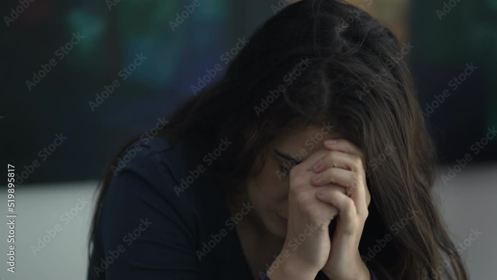 Fearful woman suffering emotional problems. One worried girl closing eyes feeling stress Fearful woman suffering emotional problems. One worried girl closing eyes feeling stress