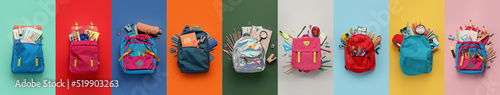 Set of school backpacks with stationery on color background photo