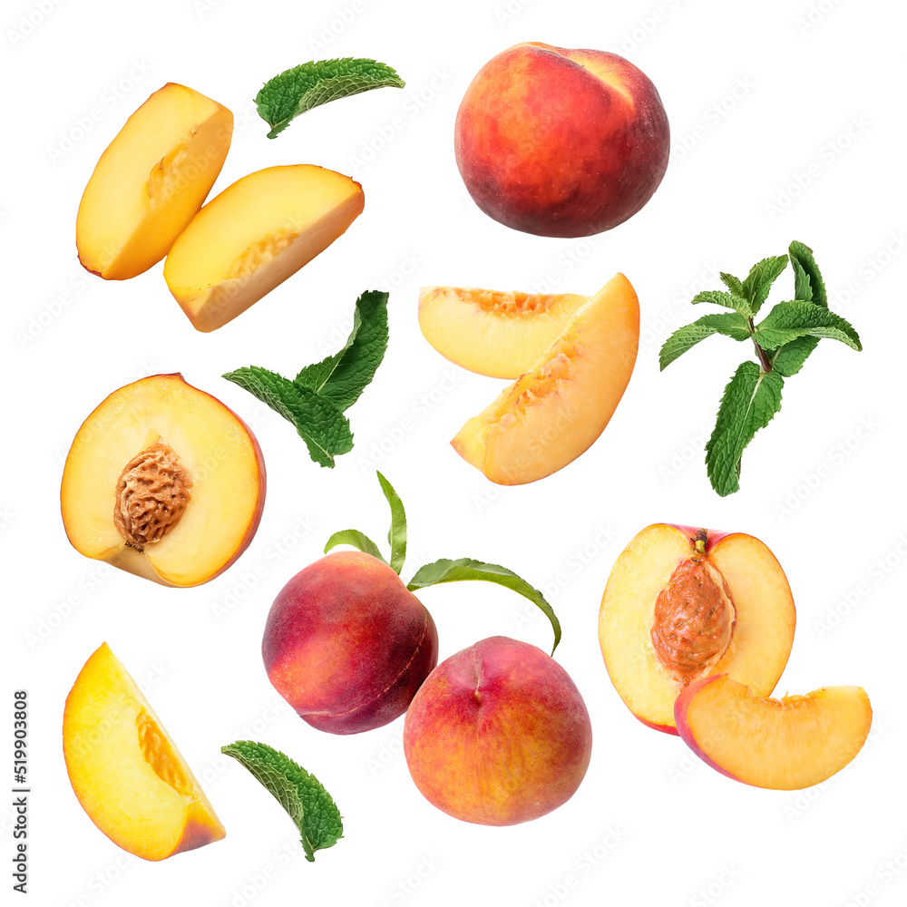 Flying ripe peaches on white background Flying ripe peaches on white background