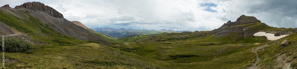 panorama of the tundra covered mountains with rain cloud skies panorama of the tundra covered mountains with rain cloud skies