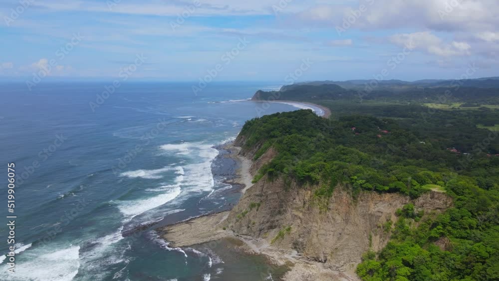 Aerial view moving forward shot, Scenic view of the colombian coastline, bright blue sky in the background. Aerial view moving forward shot, Scenic view of the colombian coastline, bright blue sky in the background.
