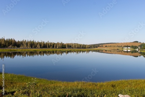 Pond and boardwalk behind the ocean and beach in Lahave NS