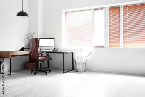 Modern workplace with chair...