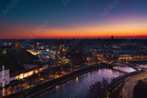 Scenic aerial view of Vilnius Old Town and Neris river at nightfall. Sunset landscape. Vilnius  Lithuania.