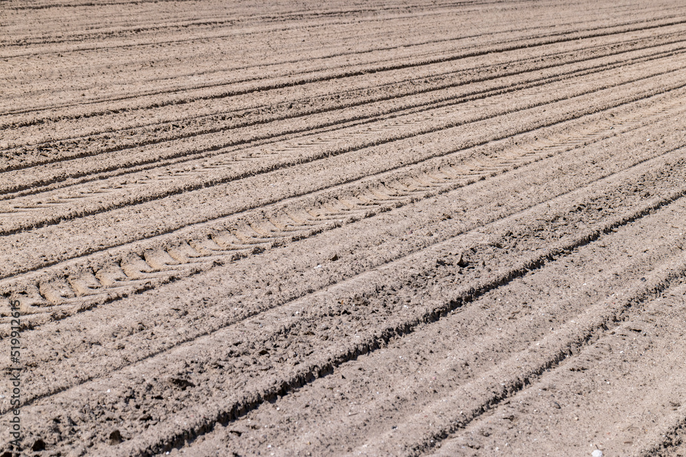 plowed soil in an agricultural field during tillage plowed soil in an agricultural field during tillage