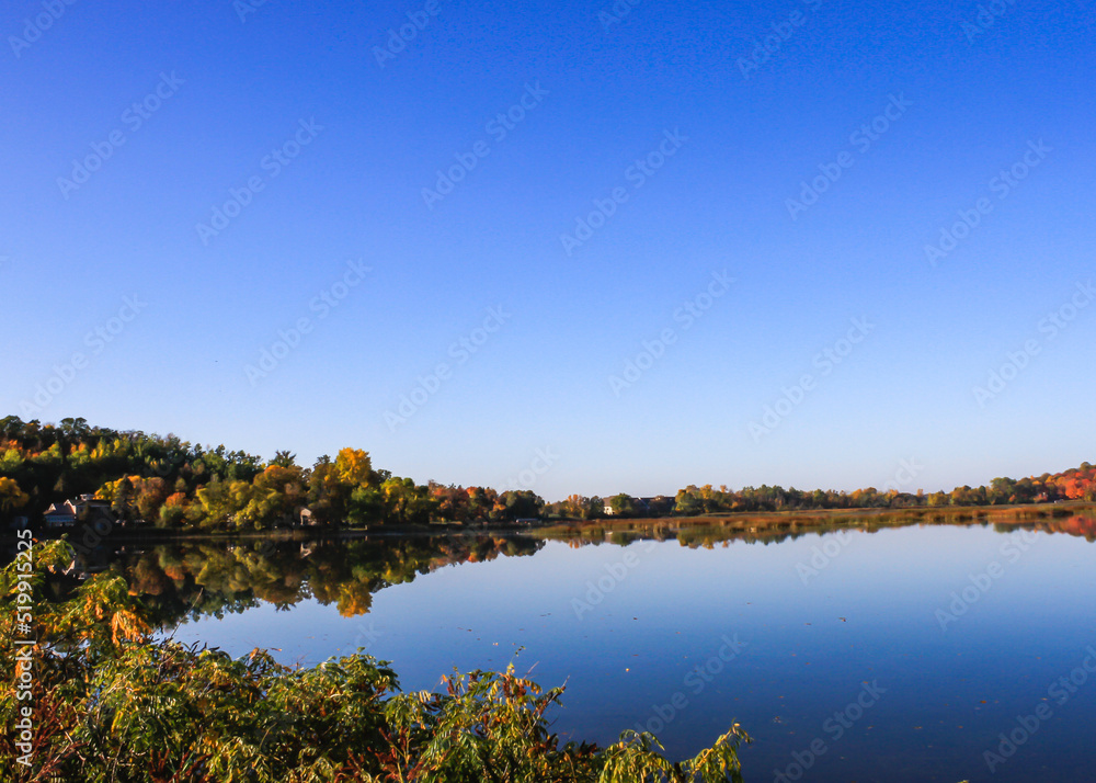 autumn landscape with lake and trees on Detroit Lake, Minnesota autumn landscape with lake and trees on Detroit Lake, Minnesota