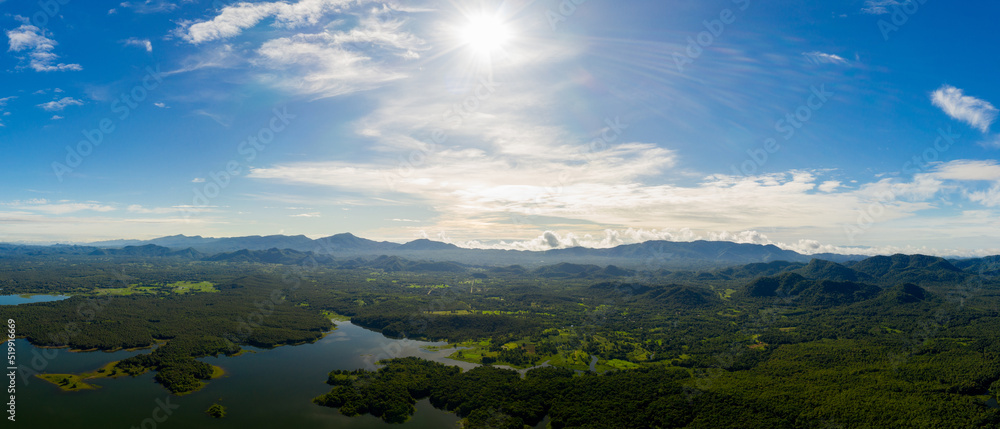 Aerial view Beautiful  panorama of morning scenery Golden light sunrise And the mist flows on high mountains forest and lake. Pang Puai, Mae Moh, Lampang, Thailand.	