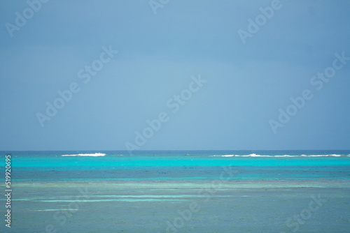 View of the ocean, an island, the sky and some clouds © AGiraldoc