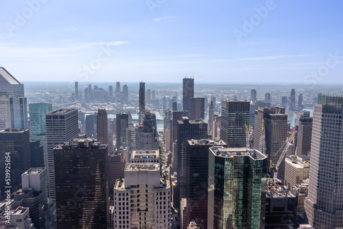 Sunny daytime cityscape skyline view of skyscrapers on Manhattan Island in New York City  New York  USA