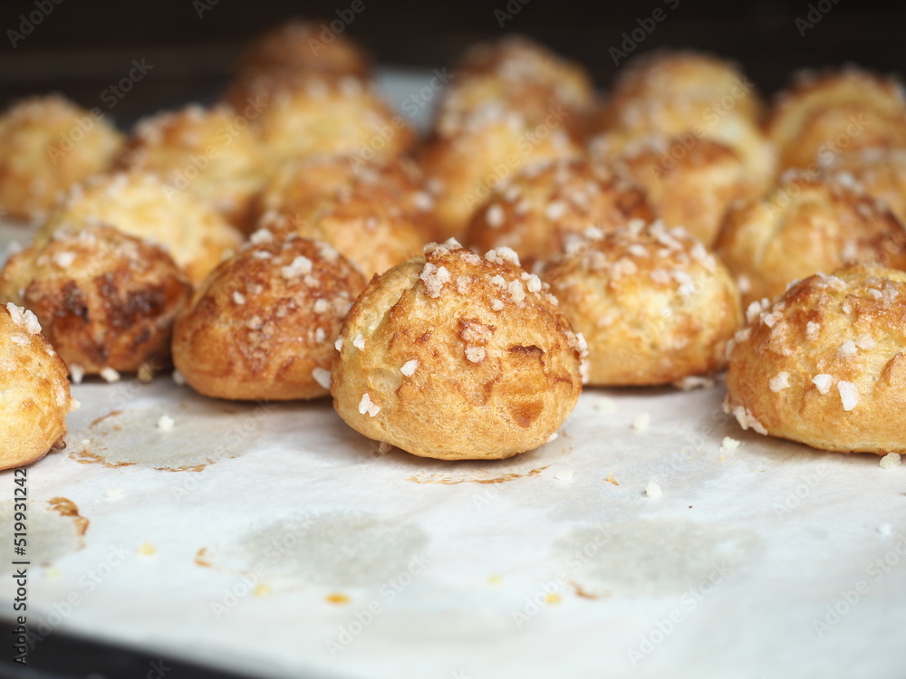 Chouquettes on baking tray Chouquettes on baking tray