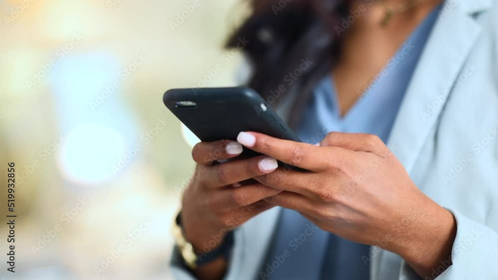 Closeup of a woman texting, browsing and scrolling on a phone in an office. Hands of a corporate executive, busy entrepreneur and business expert typing a message while networking with clients online Closeup of a woman texting, browsing and scrolling on a phone in an office. Hands of a corporate executive, busy entrepreneur and business expert typing a message while networking with clients online