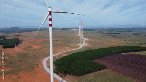 Freshly built power plant windmills in Vietnam, aerial close up view photo