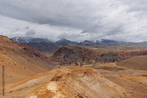 Gobi desert lifeless landscape mountains Altai Republic Russia, texture of red sandstone in Mars valley