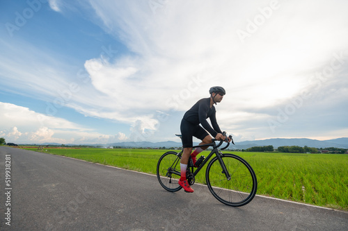 sportsman person cycling on the road, outdoor lifestyle, an athlete is a race, active adventure riding, bike, summer exercise concept