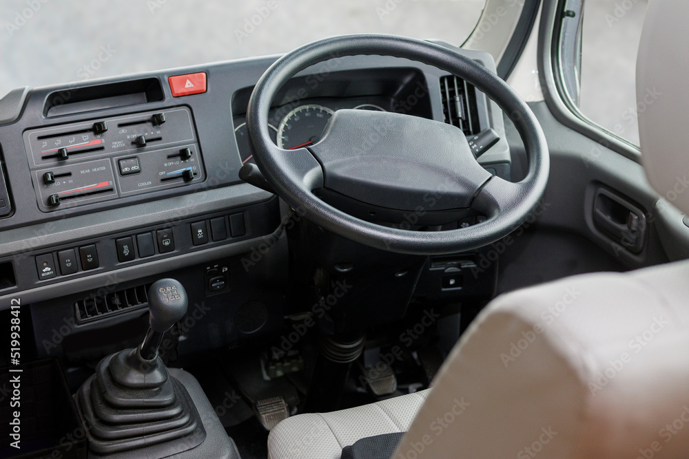 Image of the driver's seat of a Japanese minibus