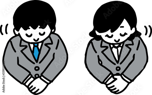 	お辞儀するスーツ姿の男女