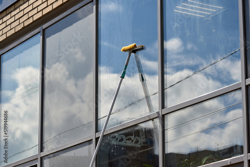window washing, washing a street shop window