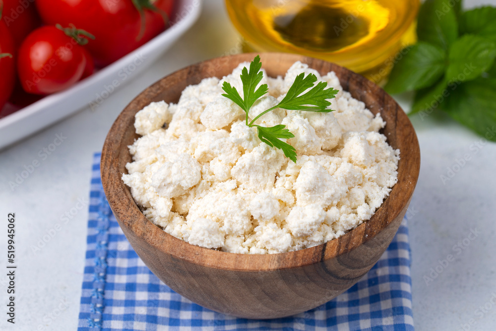 Curd cheese in wooden bowl (Turkish name; lor peyniri) Curd cheese in wooden bowl (Turkish name; lor peyniri)