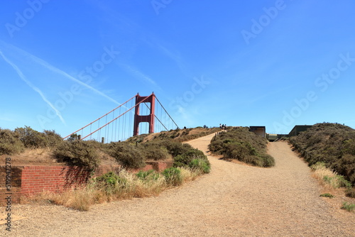 Peek of the Golden Gate hiking up to Battery Spencer, Marin Headlands, California photo