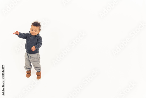jumping afro american boy - isolated. High quality photo