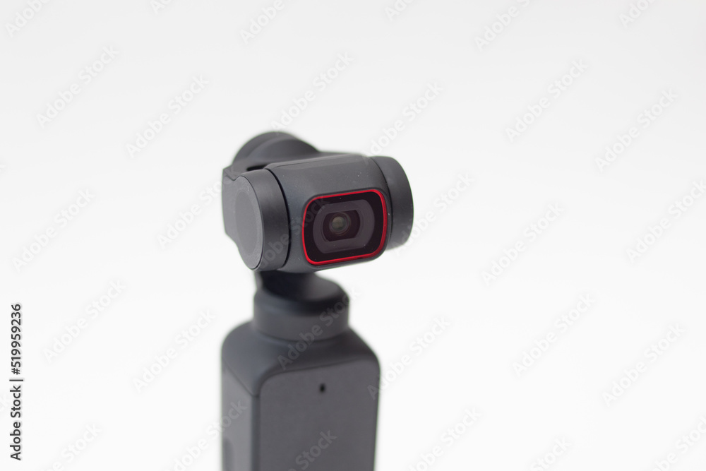 Action Camera video gimbal stabilizator on white background Action Camera video gimbal stabilizator on white background