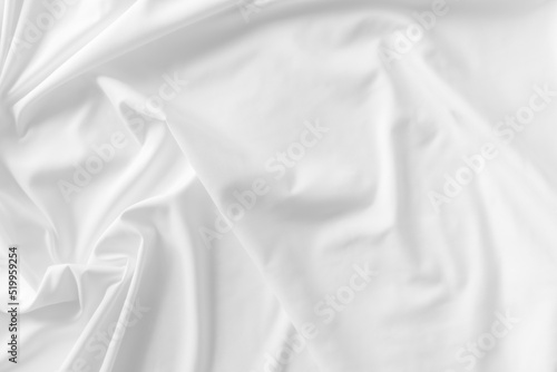 White fabric. luxurious white fabric texture background. Creases of satin, silk, and cotton. 