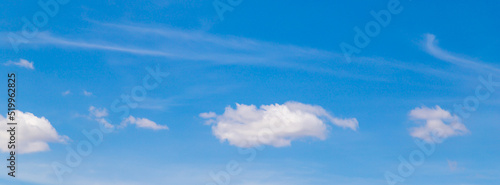 Fototapeta Naklejka Na Ścianę i Meble -  Blue sky with a few clouds background.