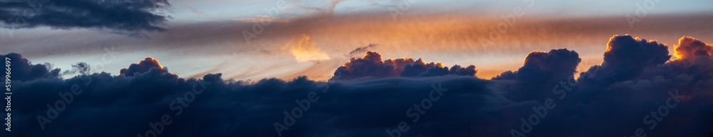 Sky panorama. Beautiful dramatic big clouds in the sky. Landscape of the power of heaven and nature. Copy space