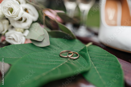 wedding rings composition. wedding rings on leaves