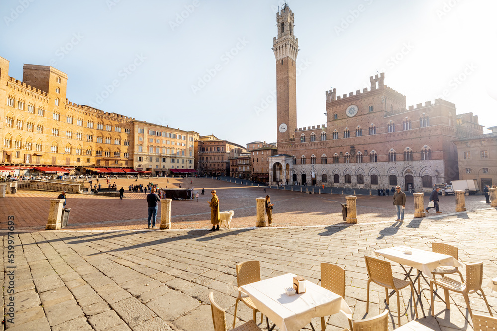 Fototapeta premium Morning view on the main square of Siena city with town hall. Concept of architecture of the Tuscan region and travel Italy