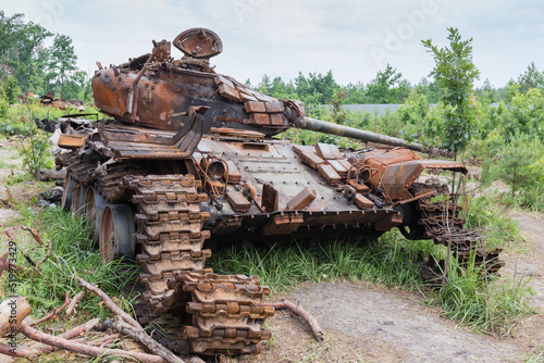 Russian tank destroyed on forest edge, invasion of Ukraine, 2022