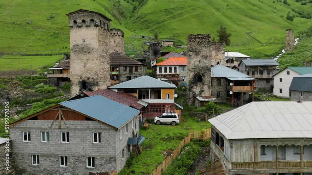 Flying Through Traditional Architecture On Adishi Medieval Mountain Village In Svaneti Region Of Georgia. Aerial Drone Shot Flying Through Traditional Architecture On Adishi Medieval Mountain Village In Svaneti Region Of Georgia. Aerial Drone Shot